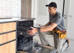 Sydney plumber completing dishwasher appliance installation