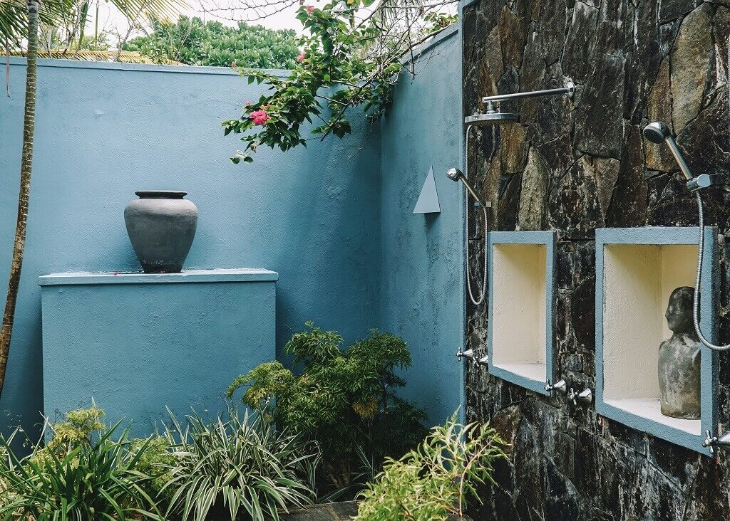 Outdoor shower installation in a tropical setting