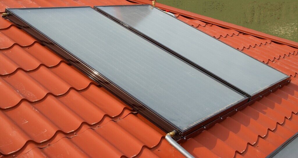 Modern solar hot water system on roof - pros and cons