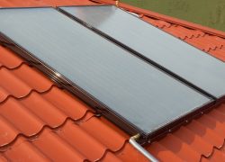 Modern solar hot water system on roof - pros and cons