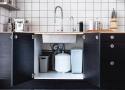 Under sink water filter installation in Sydney kitchen