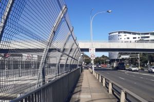 Bridge in Concord for both pedestrians and vehicles. North Sydney city landscape. Area serviceable by Gladesville Plumbing Services.