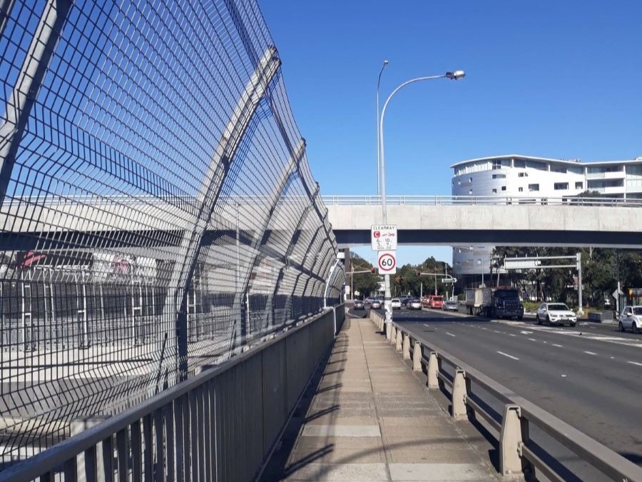 Bridge in Concord for both pedestrians and vehicles. North Sydney city landscape. Area serviceable by Gladesville Plumbing Services.