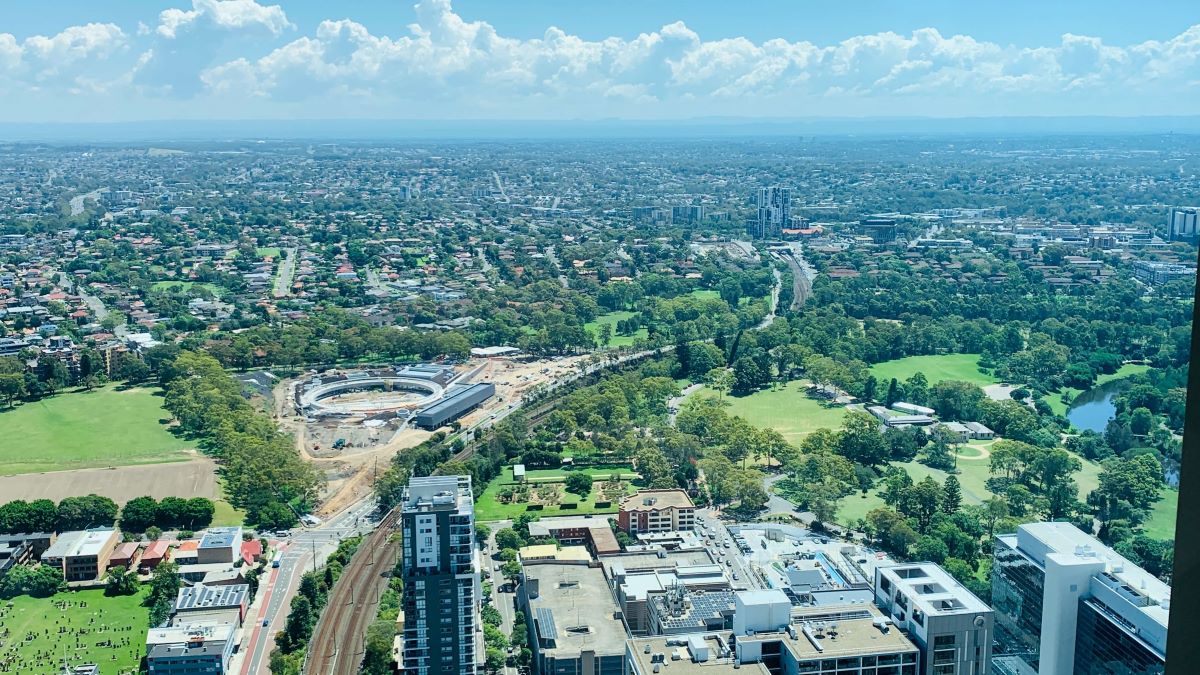 Landscape view of West Sydney Suburb of Paramatta. Lots of houses and greenery. Gladesville Plumbing Services also offers emergency plumbing to Greater Sydney area.