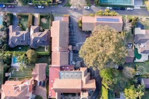 Direct top down view of suburban homes of different sizes in Denistone North Sydney. Plumbing services available from Gladesville Plumbing Services.
