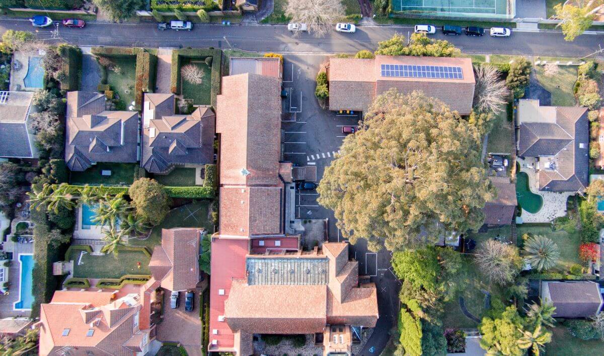 Direct top down view of suburban homes of different sizes in Denistone North Sydney. Plumbing services available from Gladesville Plumbing Services.