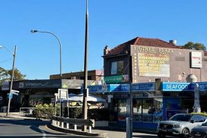 Commercial area with view of seafood restaurant and café in Lane Cove, Figtree Plaza. Service area for regular and emergency plumbing by Gladesville Plumbing Services.