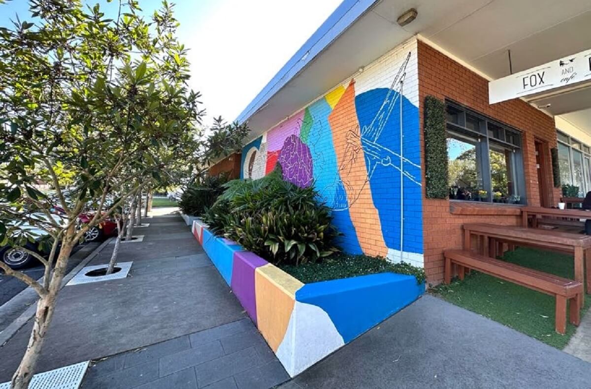 Mural on side of cafe situated in East Ryde, within the area serviced by Gladesville Plumbing Services