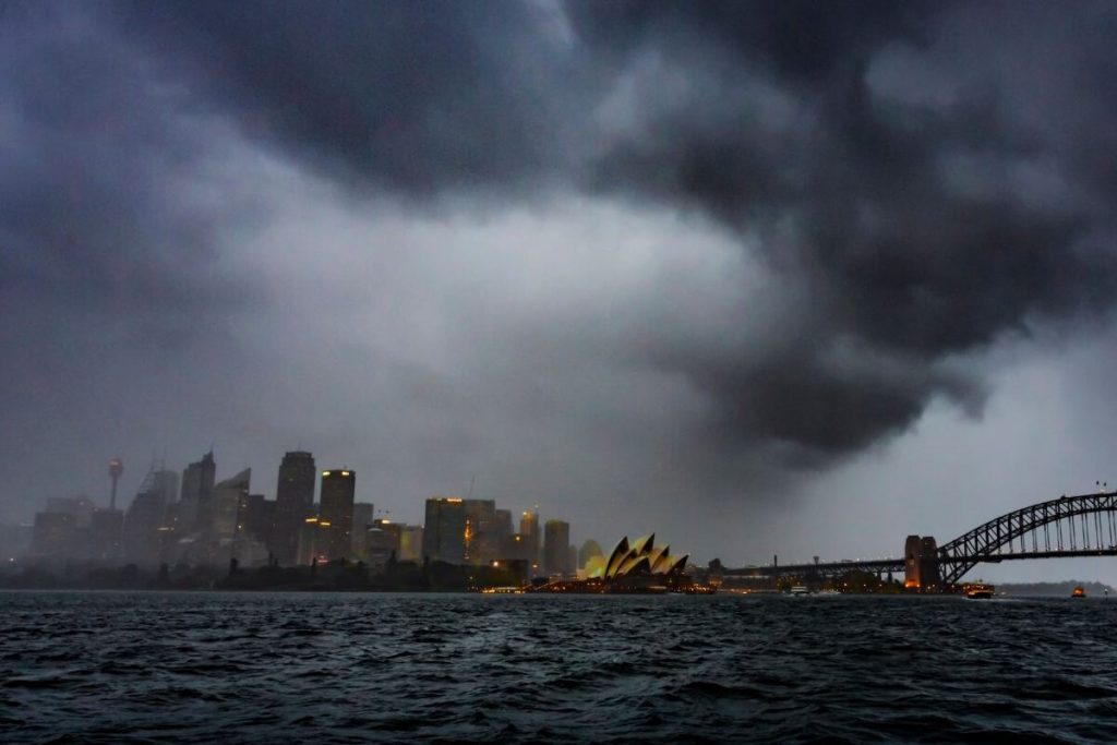 Rain Bomb bearing down on Sydney, turning day to night. Syndey plumbers can advise helpful mitigation strategies